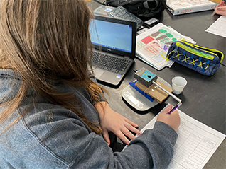 Girl working on chromebook